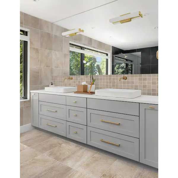 A bathroom with white cabinets

Description automatically generated with low confidence